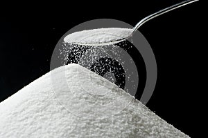 Sugar Falling from Spoon