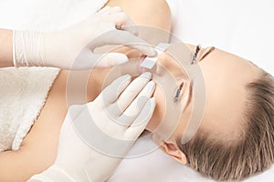 Sugar hair removal from woman body. Wax epilation spa procedure. Procedure beautician female. Mustache