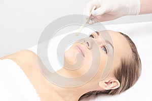 Sugar hair removal from woman body. Wax epilation spa procedure. Procedure beautician female. Mustache