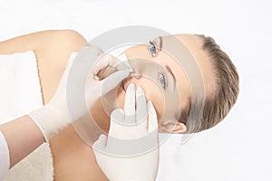 Sugar hair removal from woman body. Wax epilation spa procedure. Procedure beautician female. Mustache