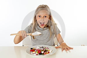 Sugar high young blonde girl eating too much sugar in nutrition concept