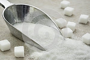 Sugar on metal scoop