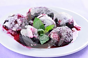 Sugar plums on white plate