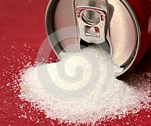 sugar pouring out from alluminium can, health concept