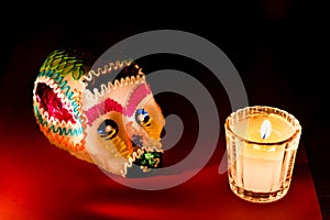 Sugar skull and candles - Calaverita - Ofrenda Dia de muertos photo