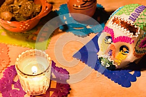 Sugar skull and candles - Calaverita - Ofrenda Dia de muertos photo