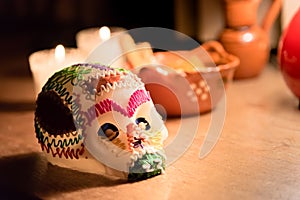 Sugar skull and candles - Calaverita - Ofrenda Dia de muertos photo