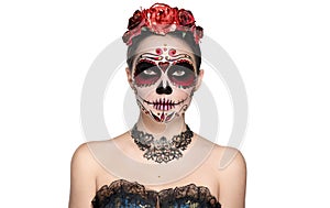 Sugar skull makeup. Halloween party make-up, traditional Mexican carnival, Santa Muerte. Beautiful young woman costume