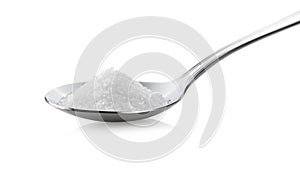 Sugar in spoon on white background