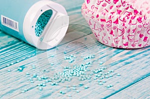 Sugar sprinkle dots, light blue decoration for cake and bekery, a lot of sprinkles as a background