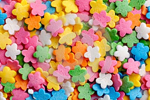 Sugar sprinkle flowers, decoration for cake and bekery, a lot of sprinkles as food background