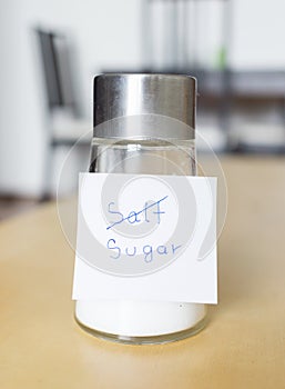 Sugar text on salt shaker