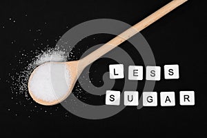 Less sugar text written with scrabble  tiles