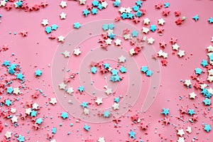 Sugar topping for cake, frame on a pink background, free space for text.