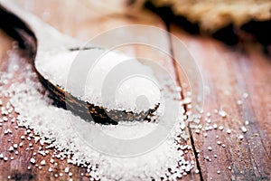 Sugar on wooden table