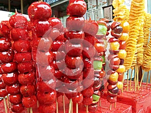 sugarcoated haws on a stick photo