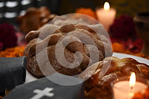 Sugary dead bread and cempasuchil flowers, cardboard coffin photo