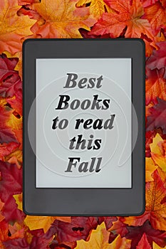 Suggested Fall reading on an e-reader on fall leaves for your au