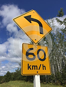 Suggested Sixty Kilometer Per Hour Sign Around Bend