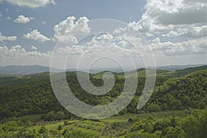 Suggestive light over green hills in Tuscany