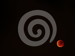 Red moon from Madrid sky Spain photo