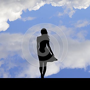 Suicidal attempt, girl standing on the edge of a roof