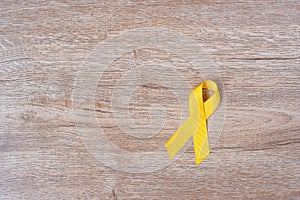 Suicide prevention and Childhood Cancer Awareness, Yellow Ribbon for supporting people living and illness. children Healthcare and