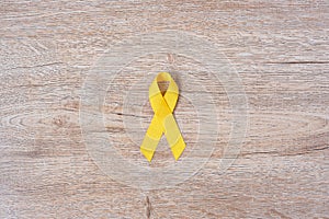 Suicide prevention and Childhood Cancer Awareness, Yellow Ribbon for supporting people living and illness. children Healthcare and