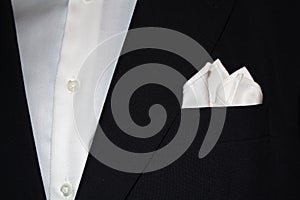 Suit with handkerchief