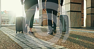 Suitcase, business people and feet with travel at airport with walking and luggage for international work commute