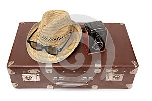 Suitcase and camera ten