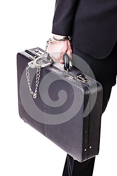 Suitcase chained to a businessman