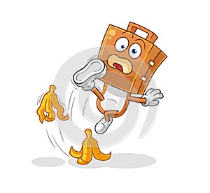 Suitcase head slipped on banana. cartoon mascot vector