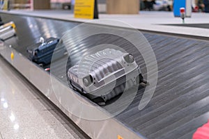 Suitcase or luggage with conveyor belt in the airport