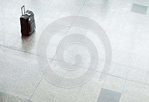 Suitcase with luggage on a floor at the airport