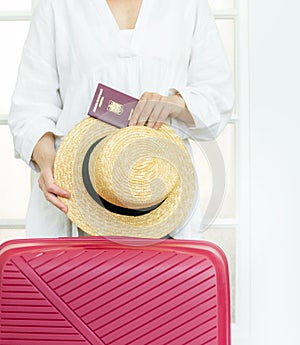 Suitcase pink passport Romanian hand woman big luggage baggage hat summer door