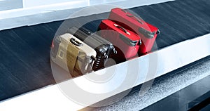 Suitcases on conveyor belt