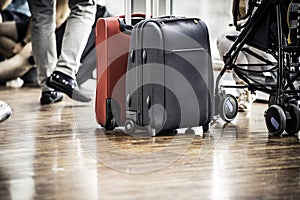 Travelers with suitcases in the airport photo