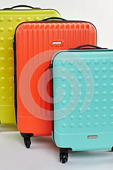 Suitcases on wheels close up.