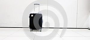Suitcases on white background,Hard shell luggage with extended telescopic handle,Ttravel concept,Copy space,Business trip photo