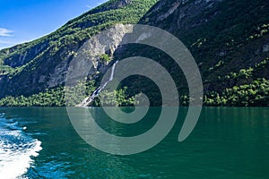 Suitor waterfall over Geiranger Fjord in the summer in Sunnmore More og Romsdal Norway