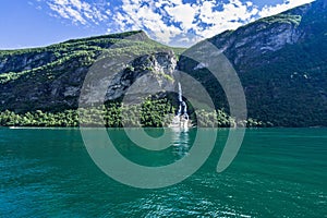 Suitor Waterfall over Geirangerfjord in the summer in Sunnmore, More og Romsdal, Norway