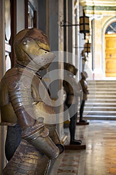 The suits of armour in the Grandmaster`s Palace. Valletta. Malta