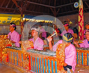 Sukawati, Bali, Indonesia - December 28, 2008: Traditional Balinese musicians playing on music instrument gamelan