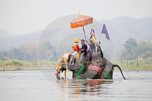 Sukhothai ordination parade on elephant back festival at Hadsiao Temple