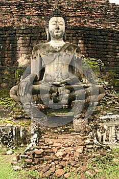 Sukhothai temple ruins buddha statue thailand