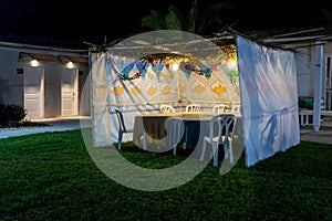 Sukkah - symbolic temporary hut for celebration of Jewish Holiday Sukkot photo