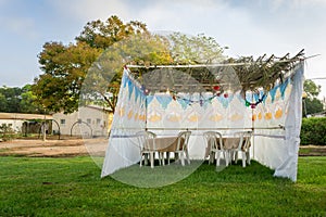 Sukkah - symbolic temporary hut for celebration of Jewish Holiday Sukkot photo