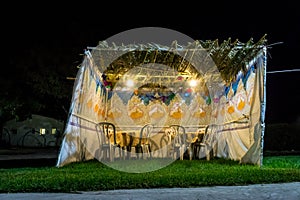 Sukkah - symbolic temporary hut for celebration of Jewish Holiday Sukkot photo