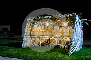 Sukkah - symbolic temporary hut for celebration of Jewish Holiday Sukkot photo